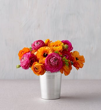 ranunculus bouquet in silver julep cup