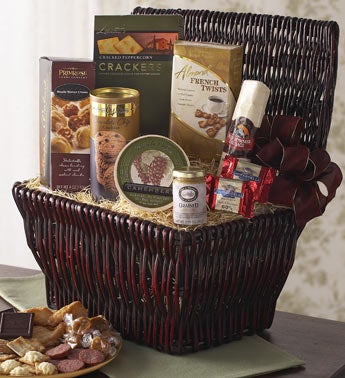 gourmet snacks in wicker hamper basket